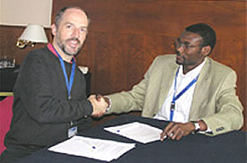 The Number Resource Organization (NRO) Chairman, Paul Wilson, and AfriNIC Project Manager, Adiel Akplogan.